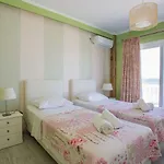 Laura House *